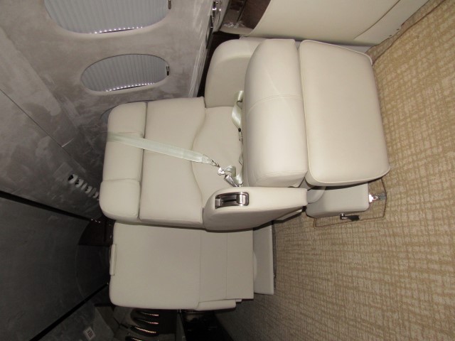 Aircraft cabin with renewed carpet and seating